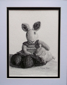 'Wallis Russell and Lamb Cuddle' Copyright Caren Taylor 2015 All Rights Reserved After sending Mrs.P a couple of little pencil sketches of her beautiful hand crafted knitted bunny, Wallis Russell and Lamb, Roma was kind enough to urge me to put some more pictures upon my Etsy site. Roma has the brilliant little store over on Etsy - see below for the fabulous little creations she makes... https://www.etsy.com/uk/shop/CottageOnTheGreen If you haven't seen Mrs. P Blog here on WordPress, I definitely urge you to have a look...... Brilliant, funny and Hand made Crafts too :-)!! 'Wallis Russell and Lamb Cuddle' Copyright Caren Taylor 2015 All Rights Reserved After sending Mrs.P a couple of little pencil sketches of her beautiful hand crafted knitted bunny, Wallis Russell and Lamb, Roma was kind enough to urge me to put some more pictures upon my Etsy site. Roma has the brilliant little store over on Etsy - see below for the fabulous little creations she makes... https://www.etsy.com/uk/shop/CottageOnTheGreen If you haven't seen Mrs. P Blog here on WordPress, I definitely urge you to have a look...... https://craftodyssey.wordpress.com/2015/09/29/the-story-behind-wallis-russell/ ...Brilliant, funny and Hand made Crafts too :-)!! 